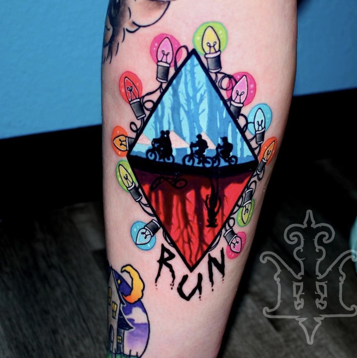 Iconic Lights and Bikes Storytelling Piece Tattoo Design