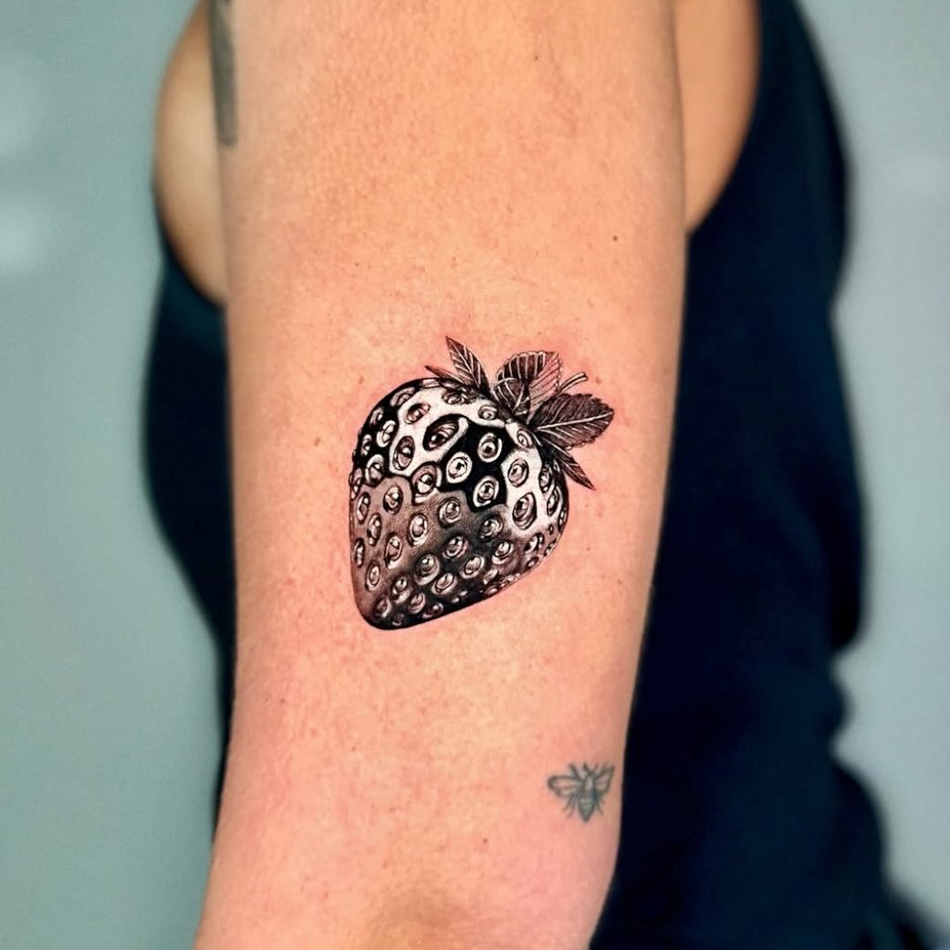 Intricate Strawberry Tattoo with Realistic Details Tattoo Design