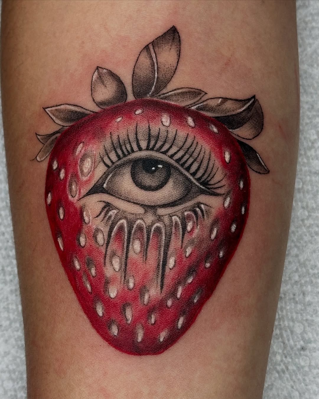Mesmerizing strawberry tattoo with hidden eye Tattoo Design