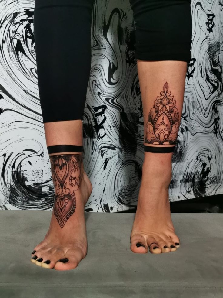 Ornamental Ankle-to-Foot Design With Warm Tones Tattoo Design