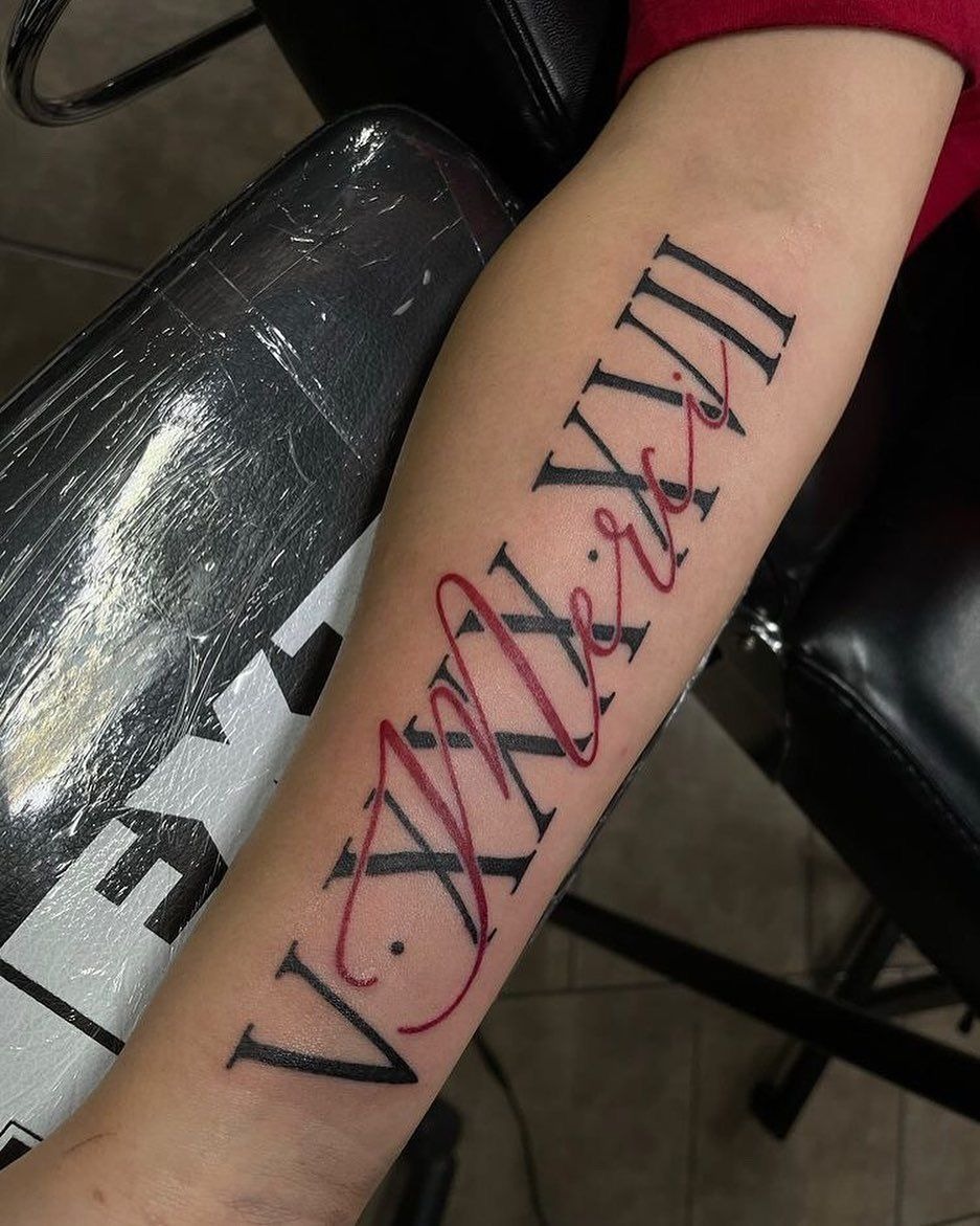 Black Roman Numerals with Red Cursive Lettering Tattoo Design