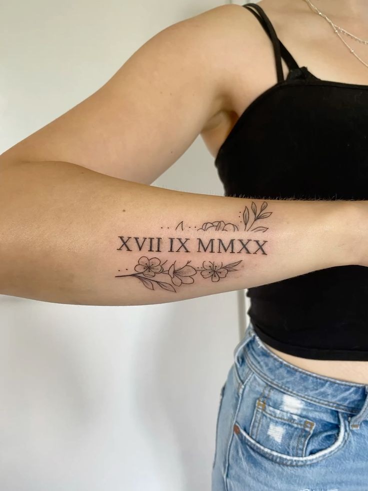 Fine Line Floral Roman Numeral Arm Tattoo Tattoo Design