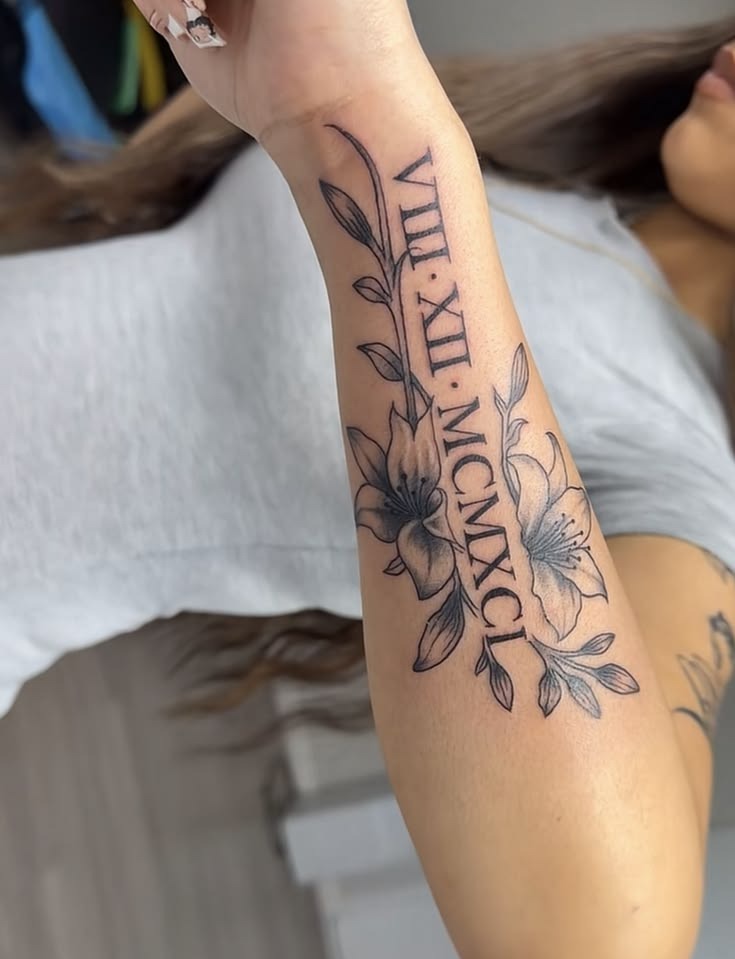 Floral Roman Numeral Forearm Tattoo Tattoo Design