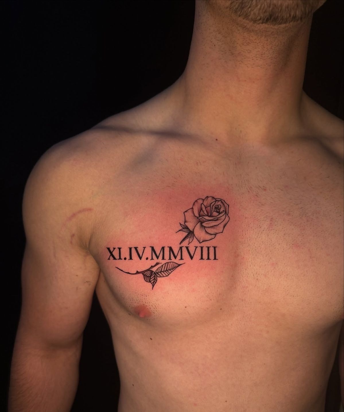 Roman Numeral Chest Tattoo with Rose Tattoo Design