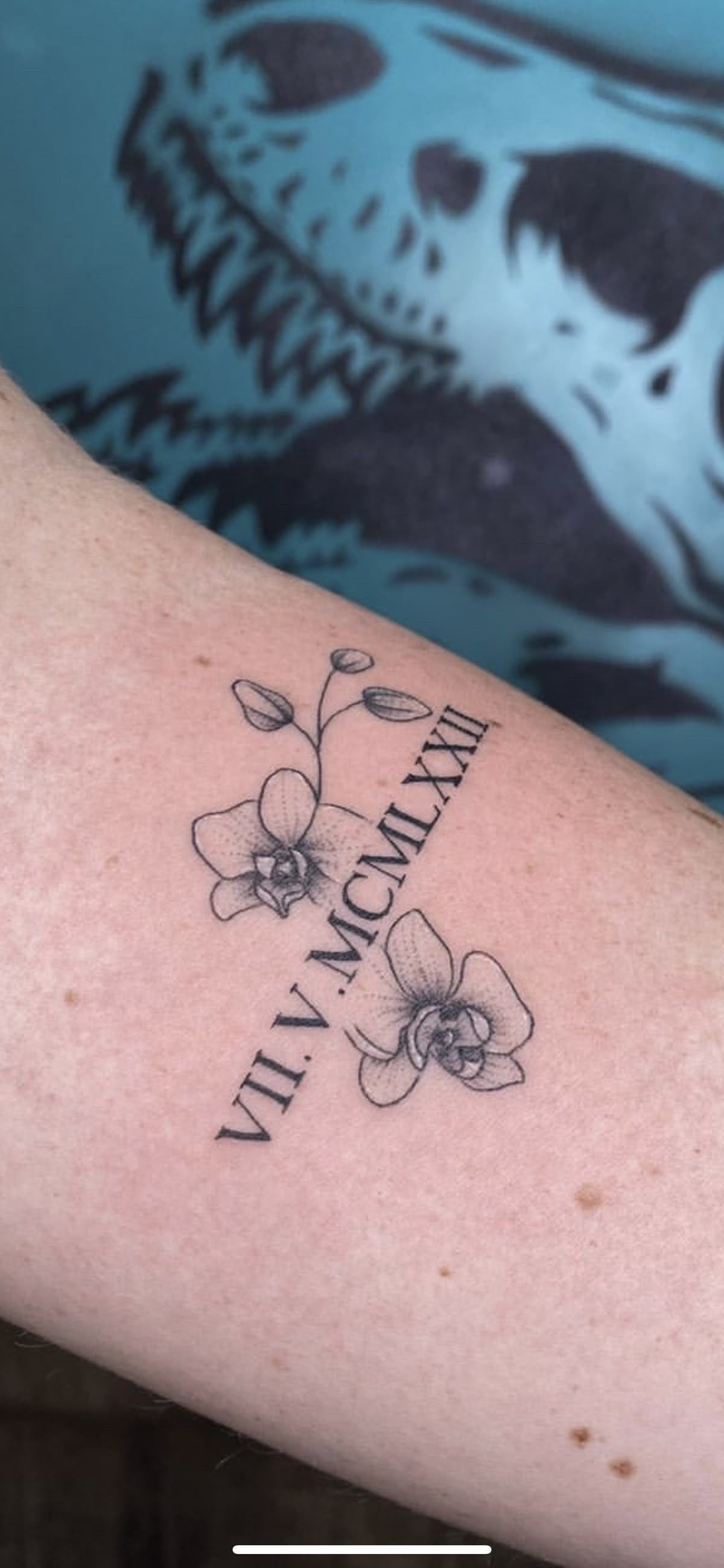 Roman Numeral Tattoo with Delicate Orchids Tattoo Design