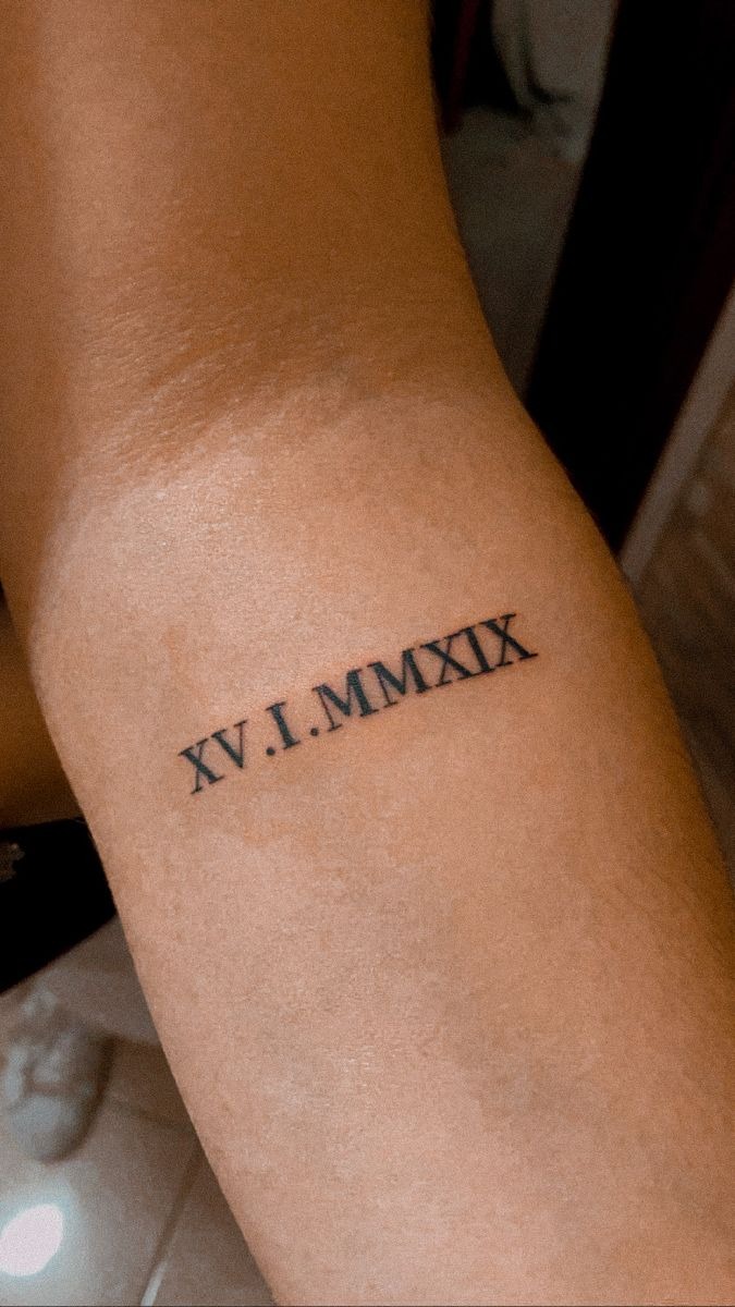 Small Classic Roman Numeral Arm Tattoo Tattoo Design