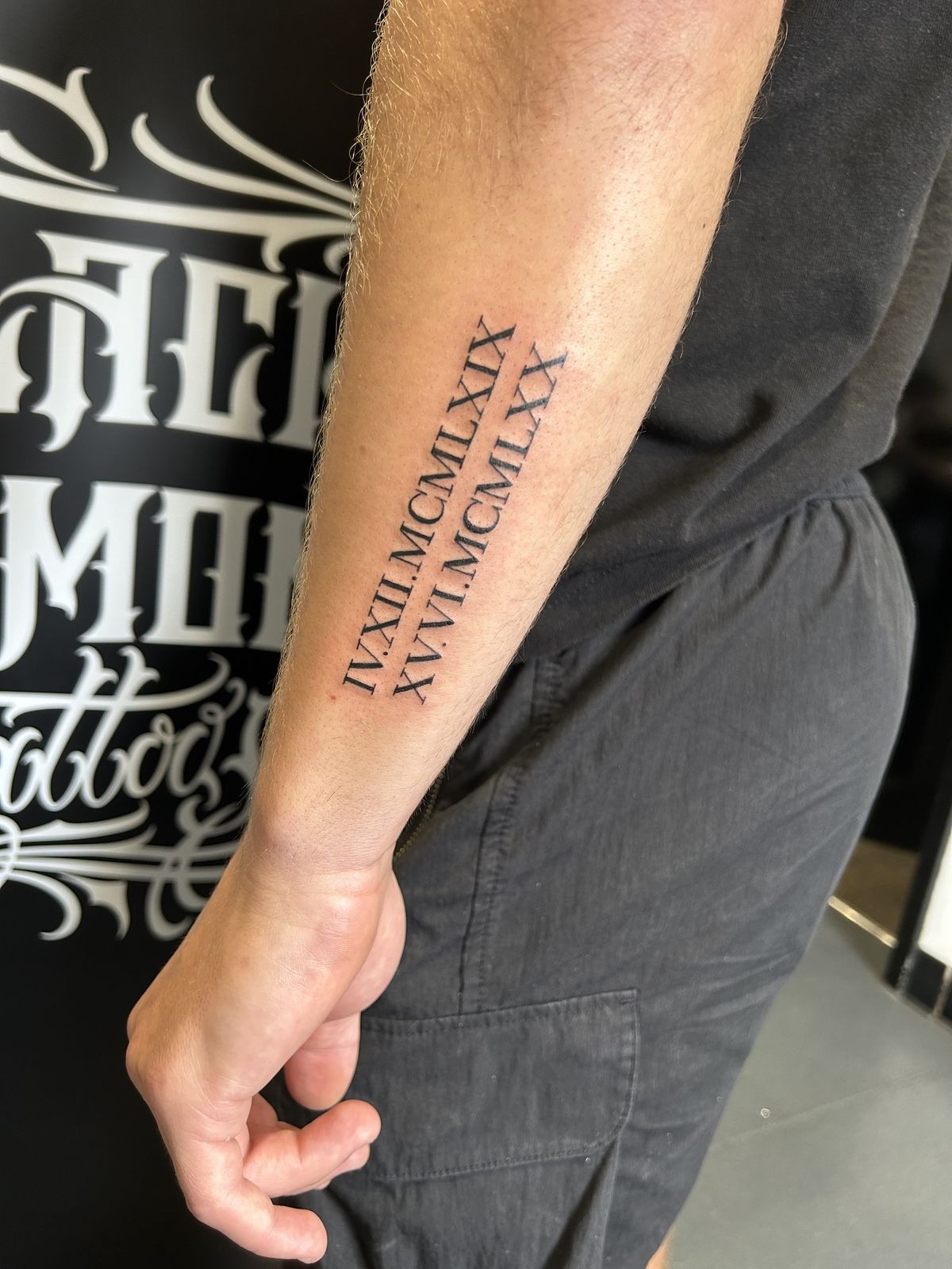 Stacked Roman Numeral Dates for Two Tattoo Design
