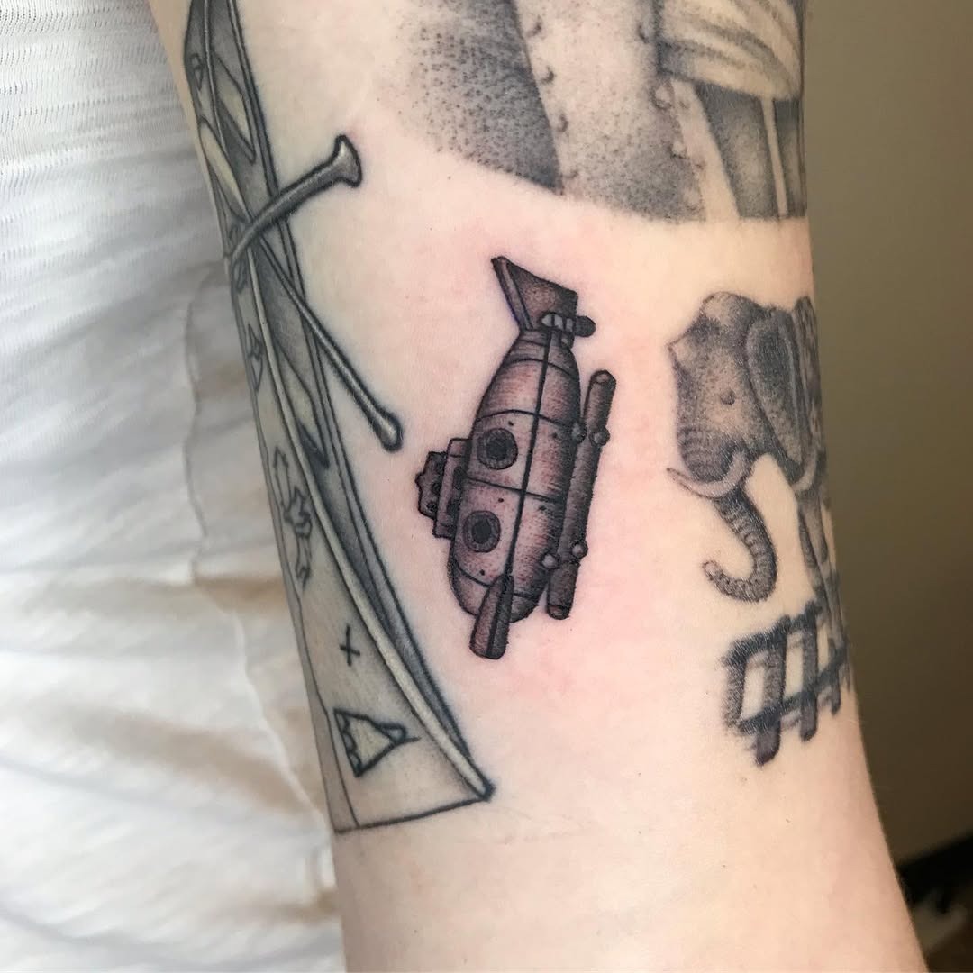 Charming submarine tattoo on arm Tattoo Design