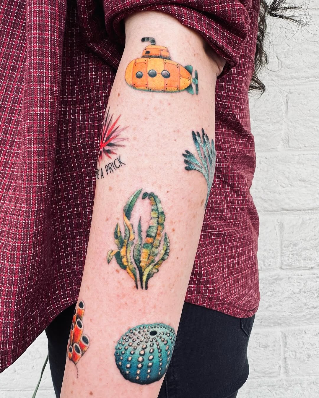 Colorful submarine tattoo adds whimsy to art Tattoo Design
