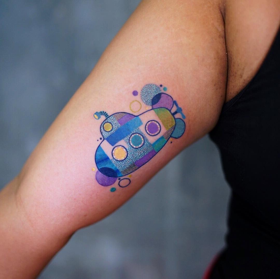 Colorful submarine tattoo embodies playful creativity Tattoo Design
