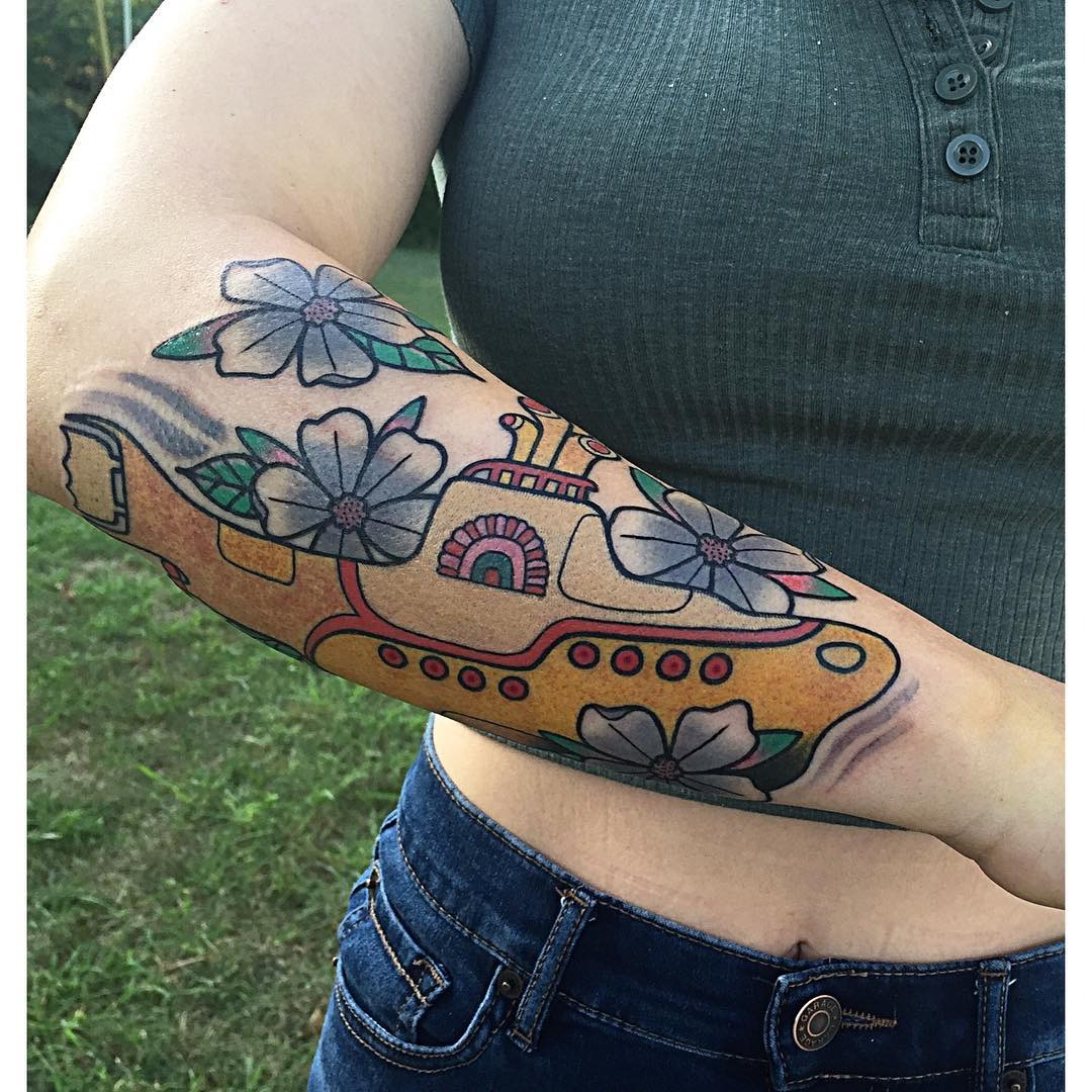 Colorful submarine tattoo with floral elements Tattoo Design