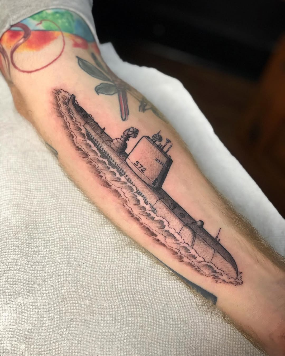 Detailed submarine tattoo on a forearm Tattoo Design