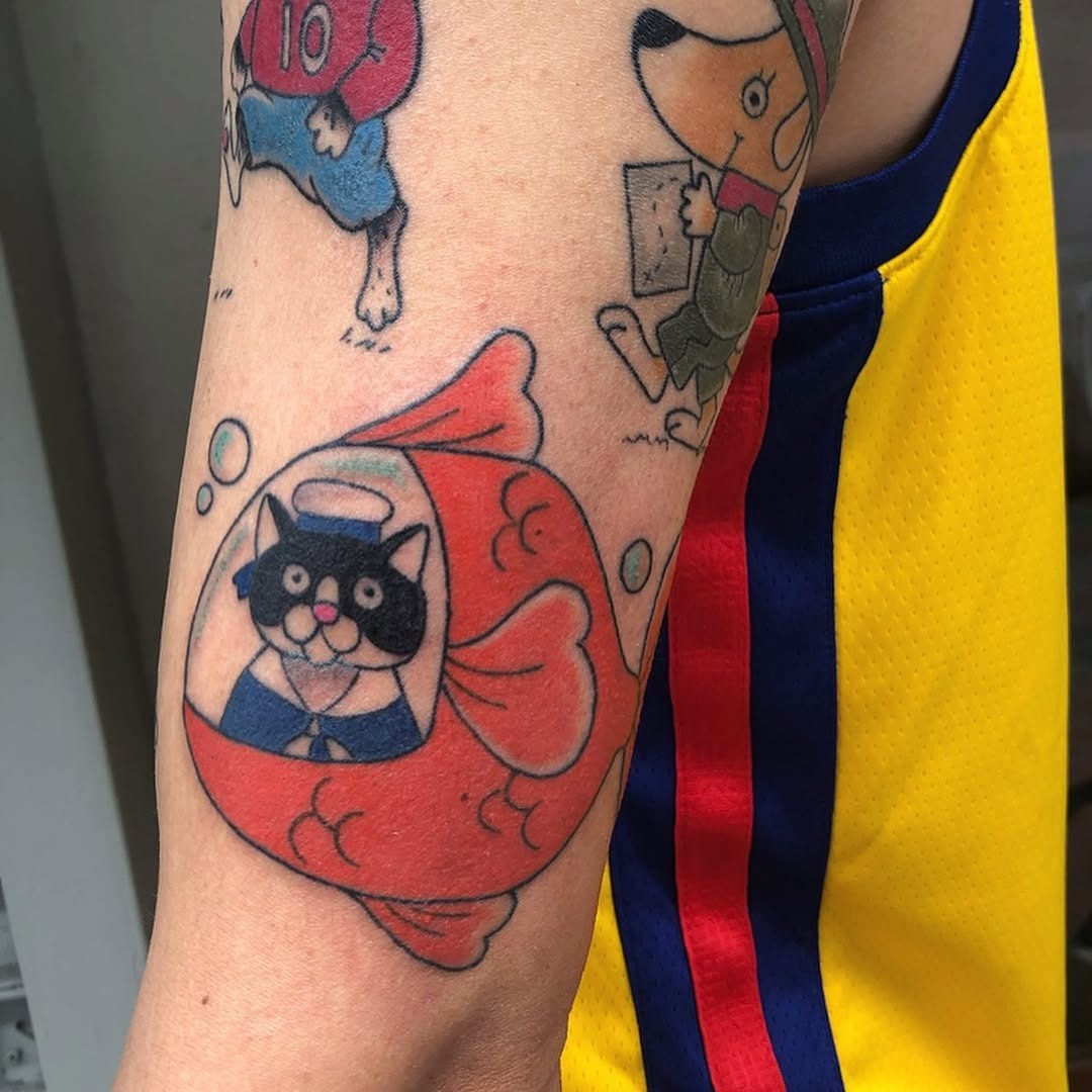 Playful cat in a submarine design tattoo Tattoo Design