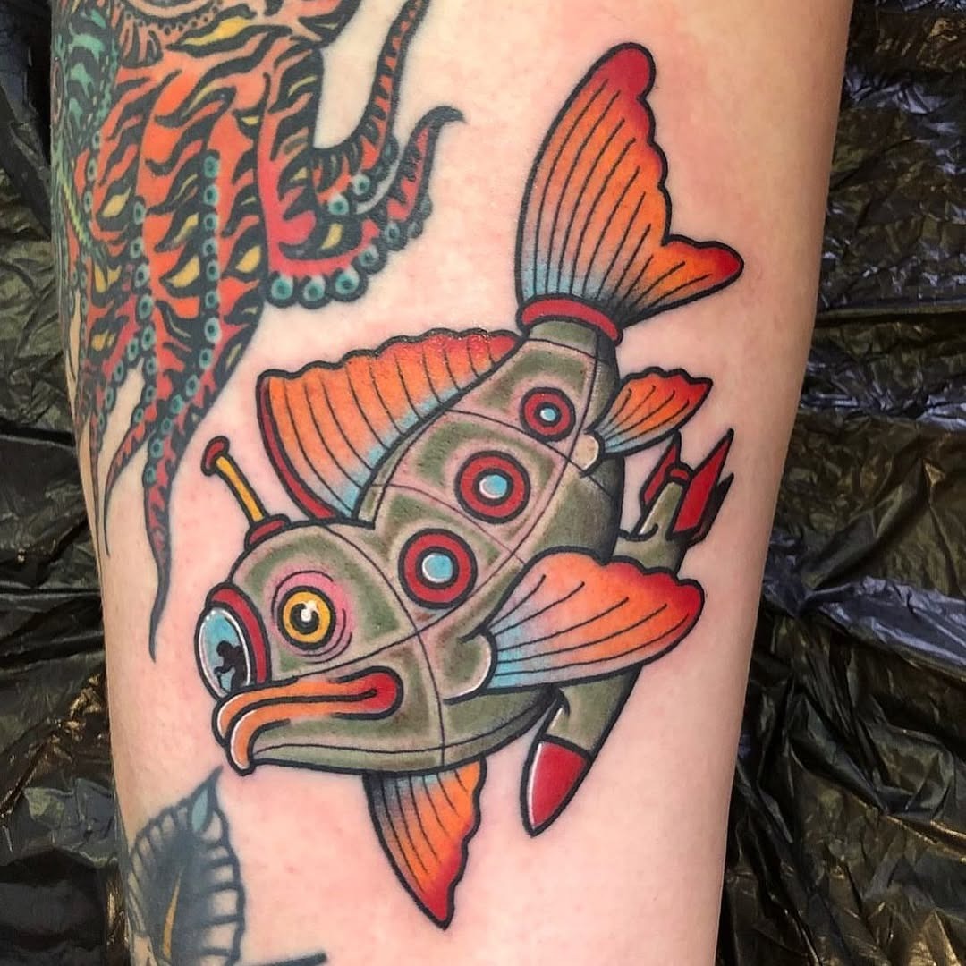 Playful submarine fish tattoo with bright colors Tattoo Design