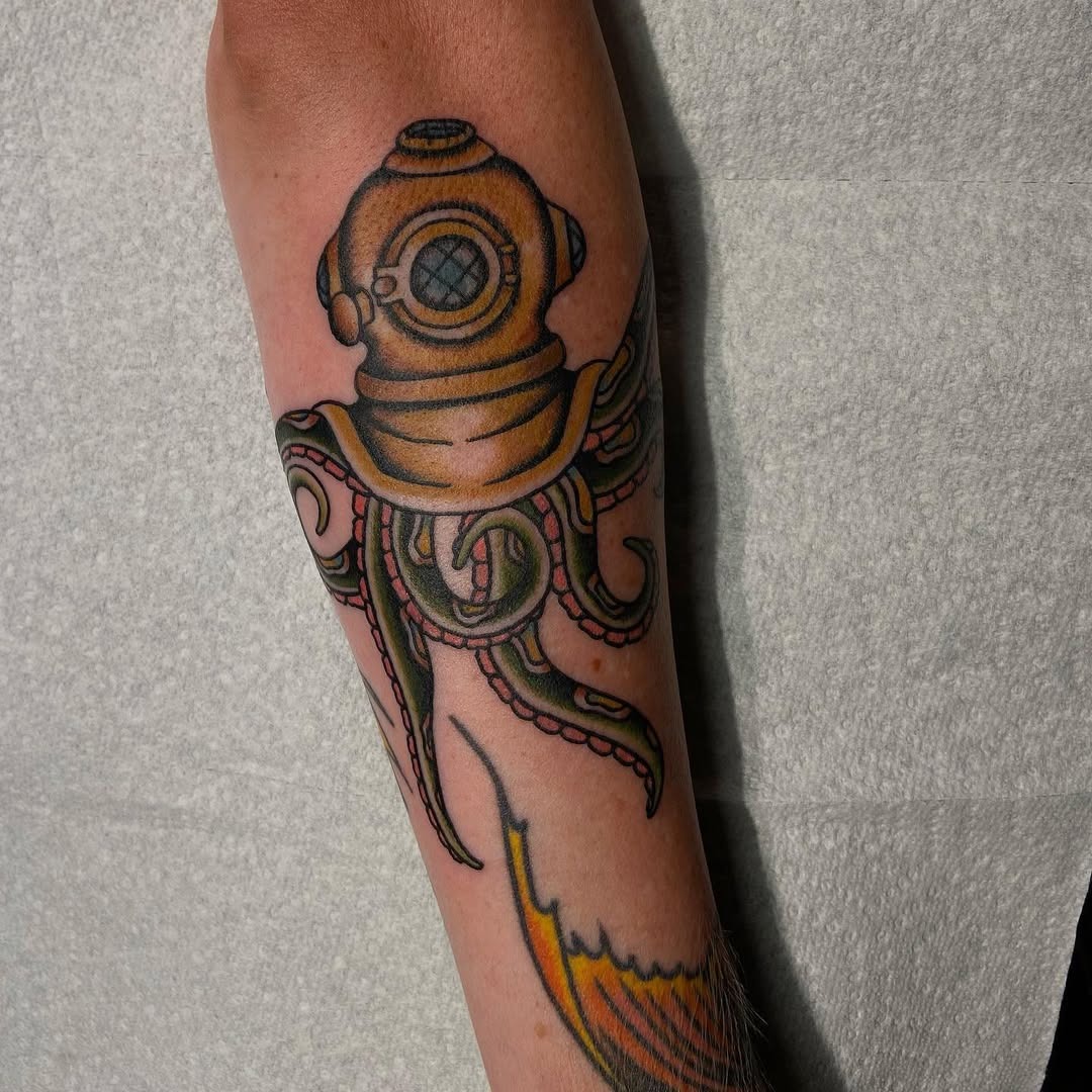 Stylish submarine diver and octopus tattoo design Tattoo Design