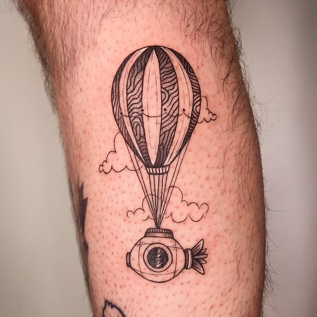 Unique blend of submarine and hot air balloon tattoo Tattoo Design
