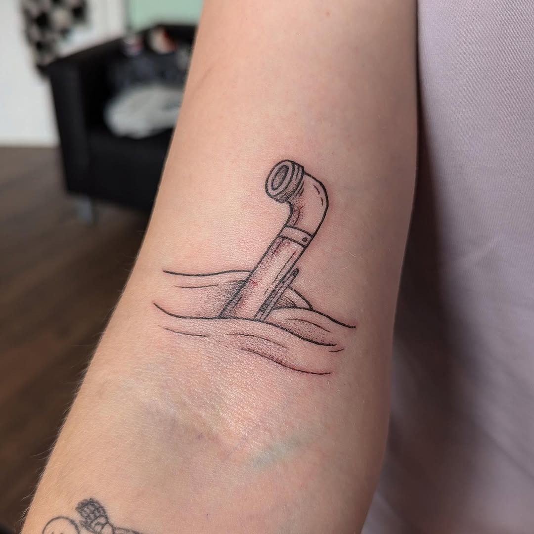Unique submarine tattoo with ripple effects Tattoo Design