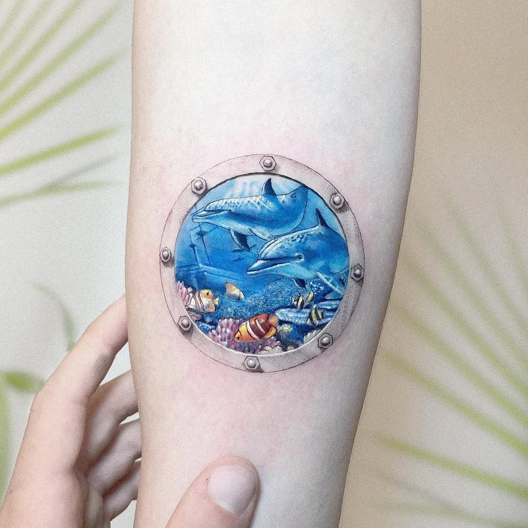 Vibrant submarine-themed tattoo showcasing marine life Tattoo Design