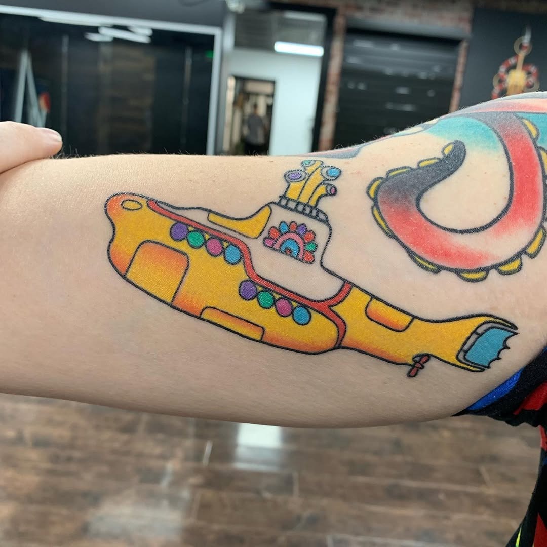 Whimsical submarine tattoo with vivid colors Tattoo Design