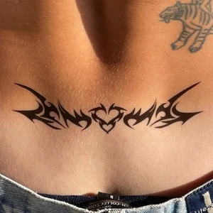 Bold Tribal Succubus Heart Tattoo Design