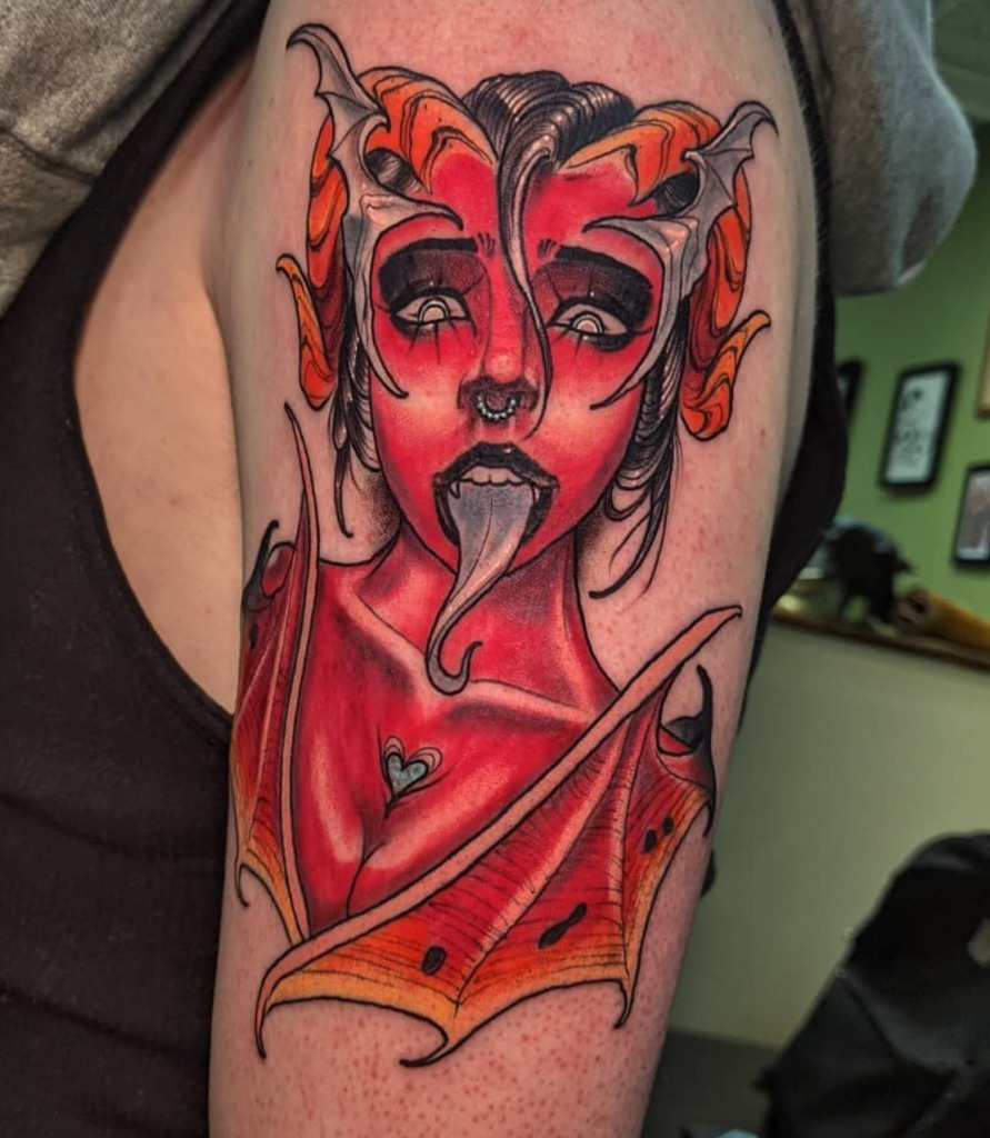 Vibrant Red and Orange Succubus with Playful Expression Tattoo Design