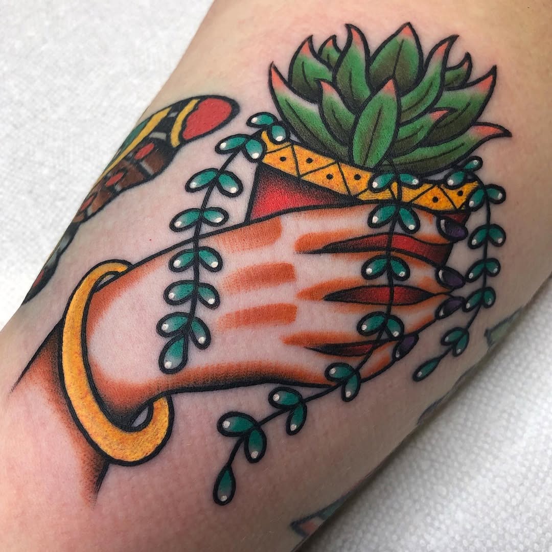 Bold succulent tattoo with vibrant colors Tattoo Design