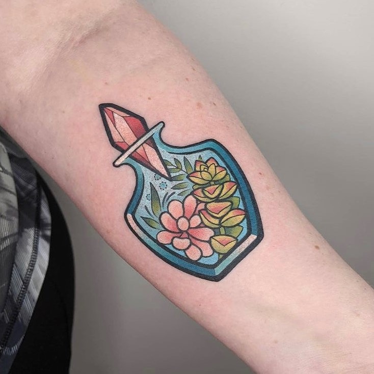 Charming Succulent Tattoo in a Crystal Flask Tattoo Design