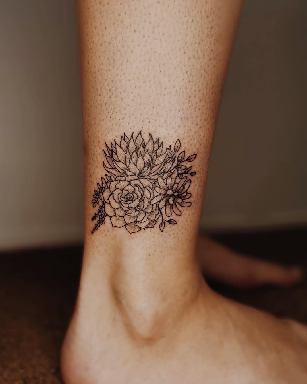 Elegant minimalist succulent tattoo on ankle Tattoo Design