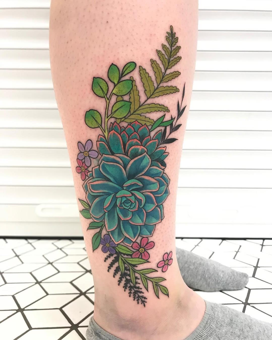 Stunning vibrant succulent tattoo on a leg Tattoo Design