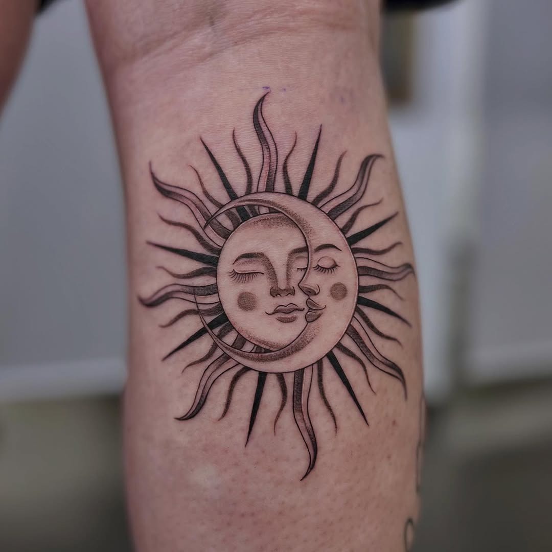A unique sun and moon tattoo with faces. Tattoo Design
