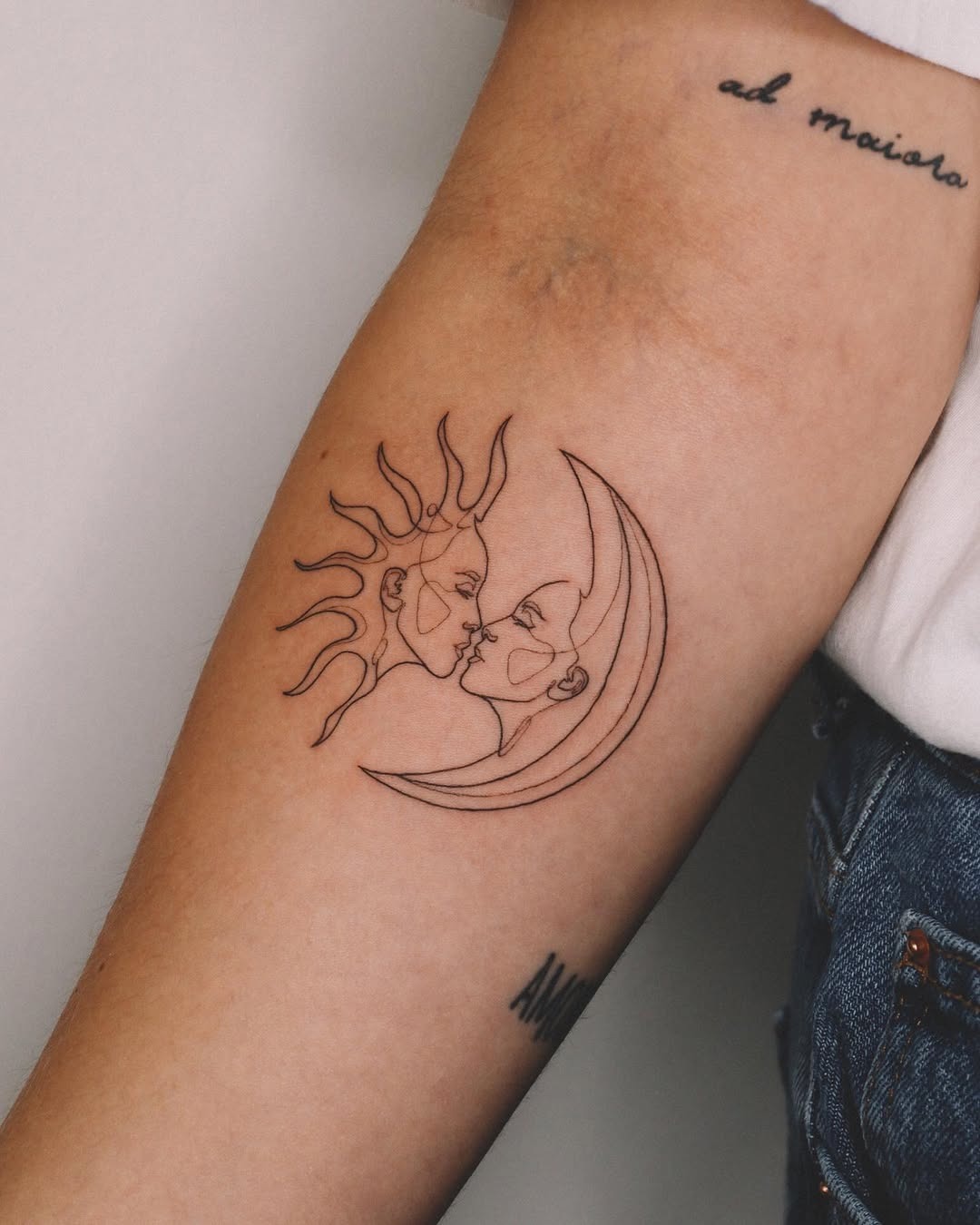 Elegant sun and moon face tattoo design Tattoo Design