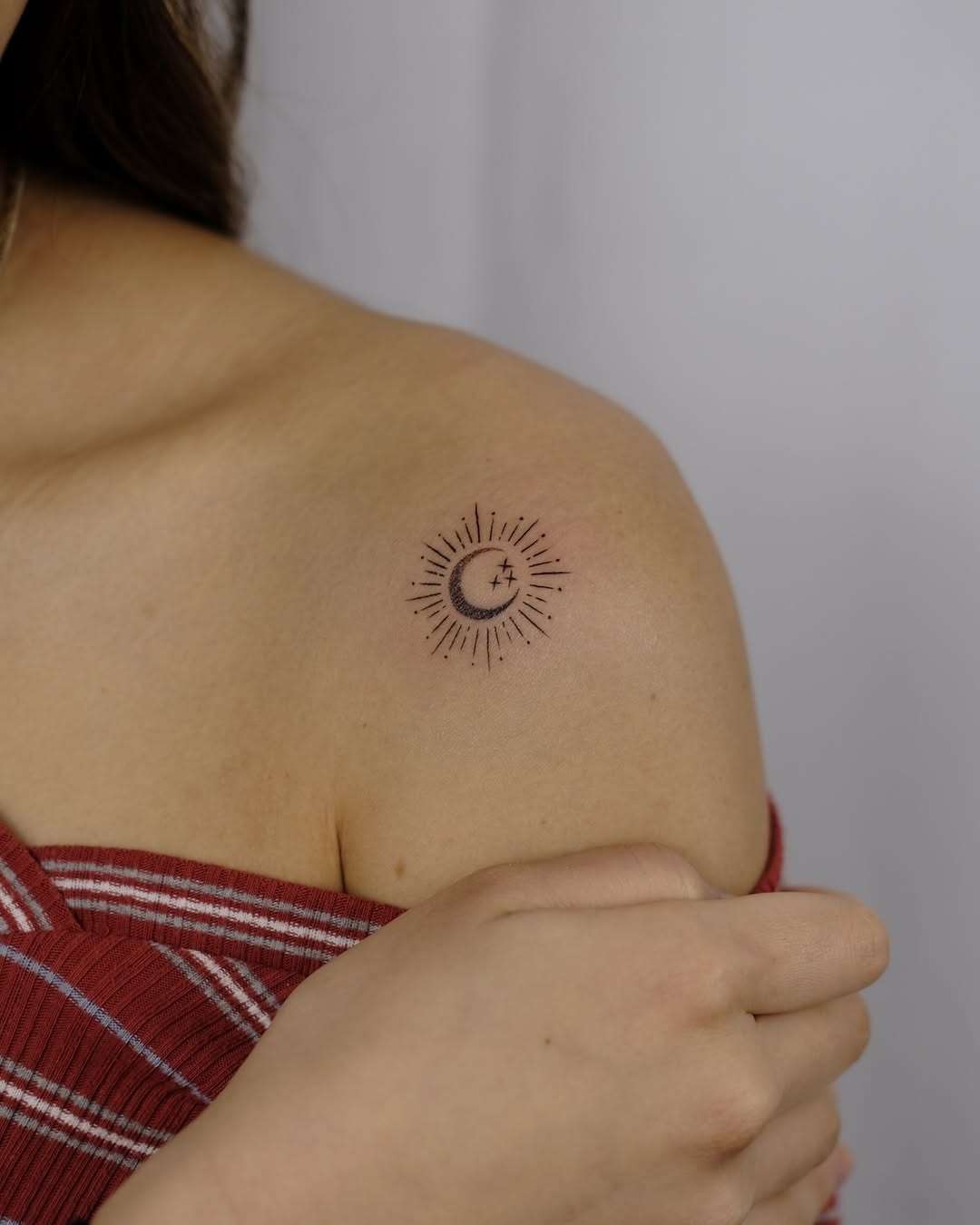 Elegant sun and moon shoulder tattoo design Tattoo Design