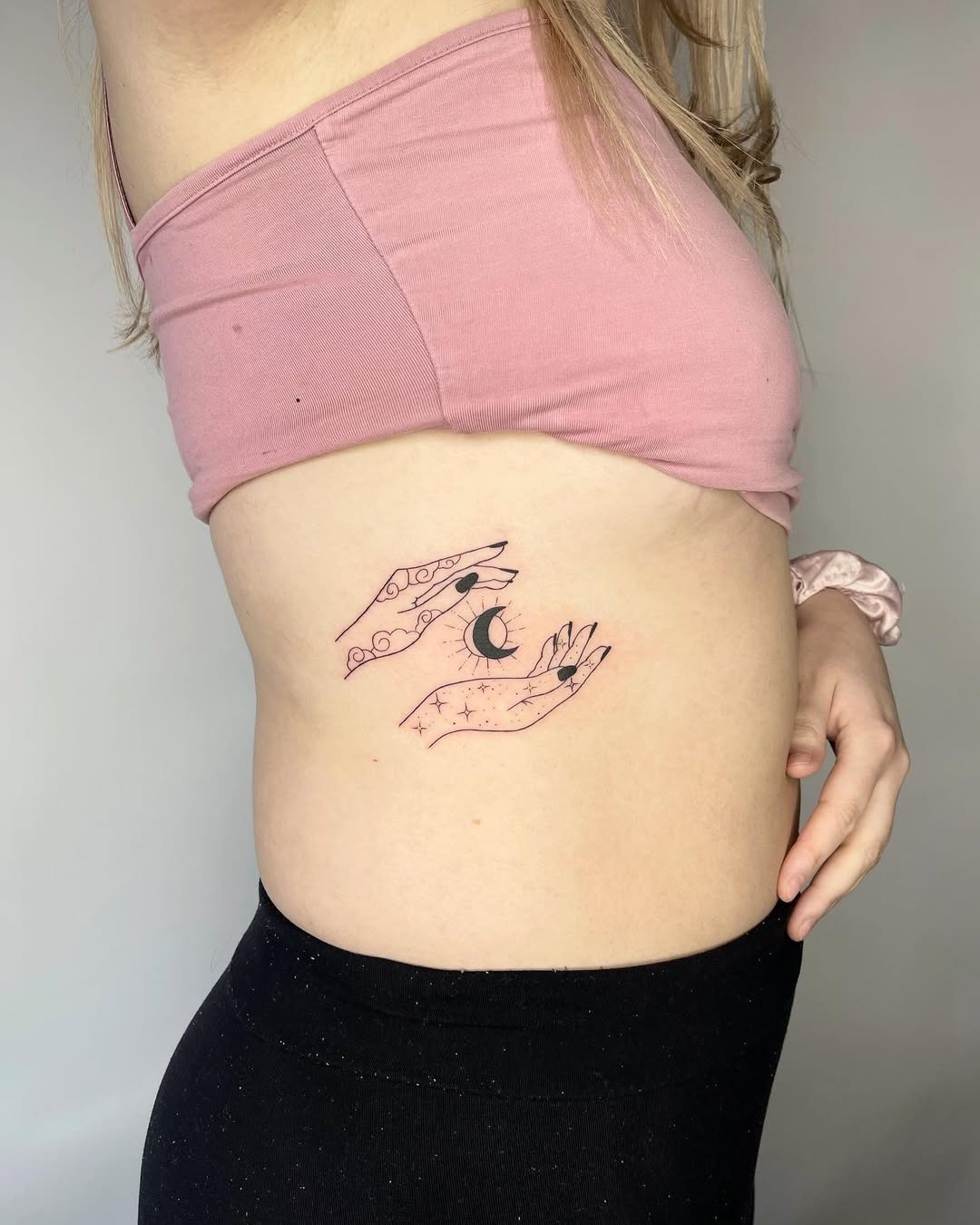 Feminine hands cradling crescent moon tattoo Tattoo Design