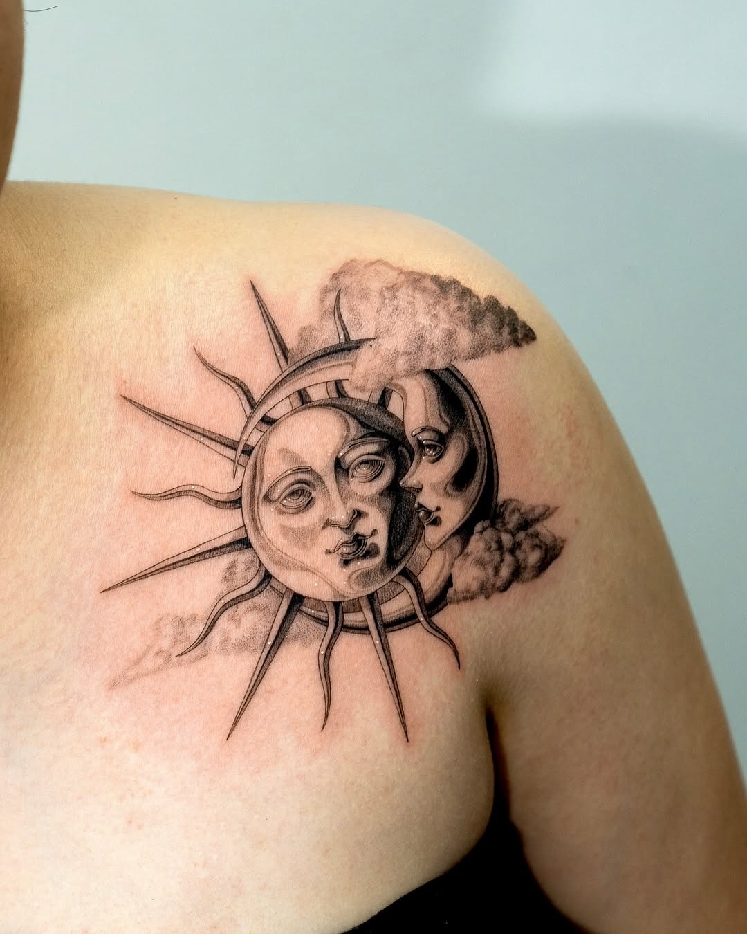 Intricate Sun and Moon Face Tattoo Art Tattoo Design