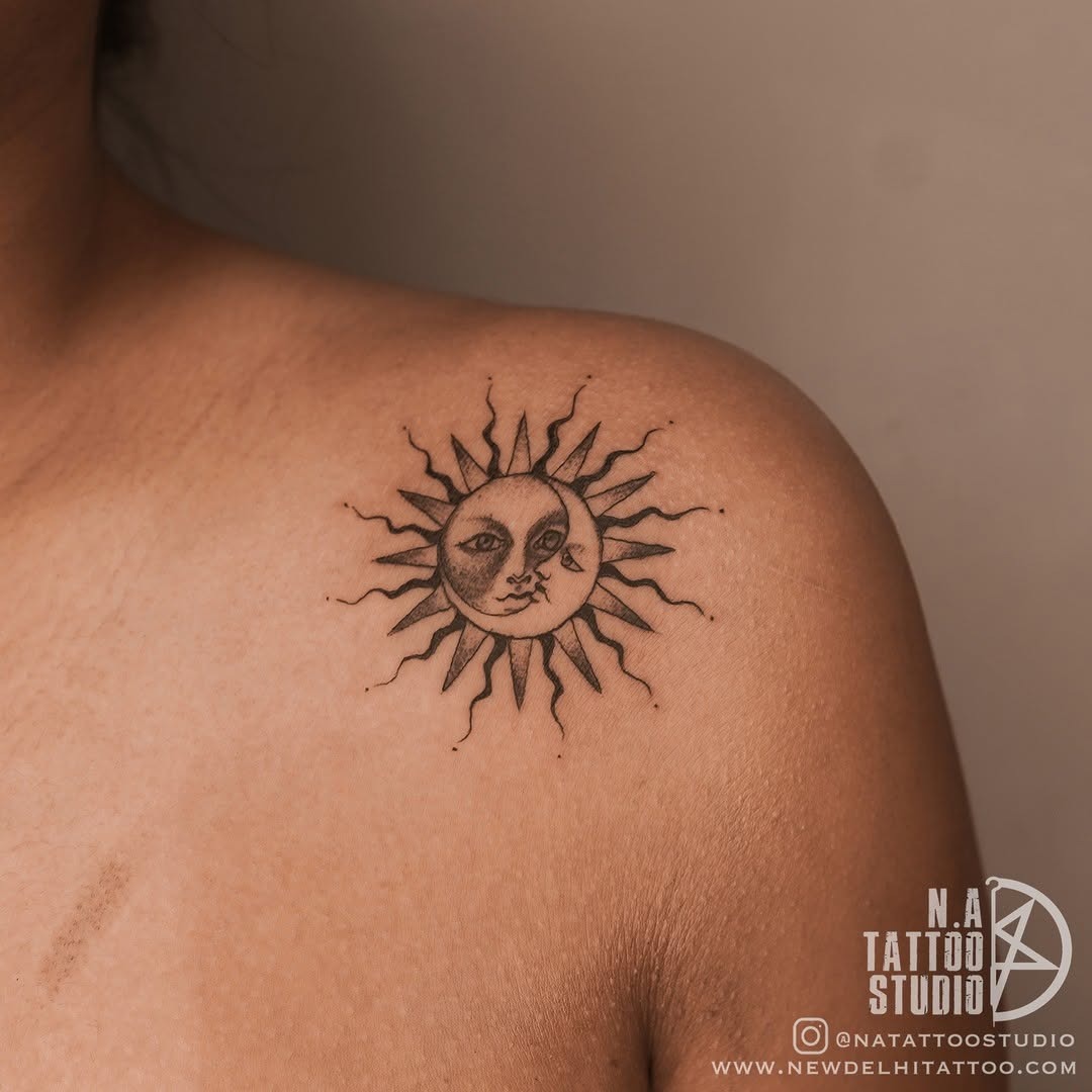 Intricate sun and moon tattoo design on shoulder Tattoo Design