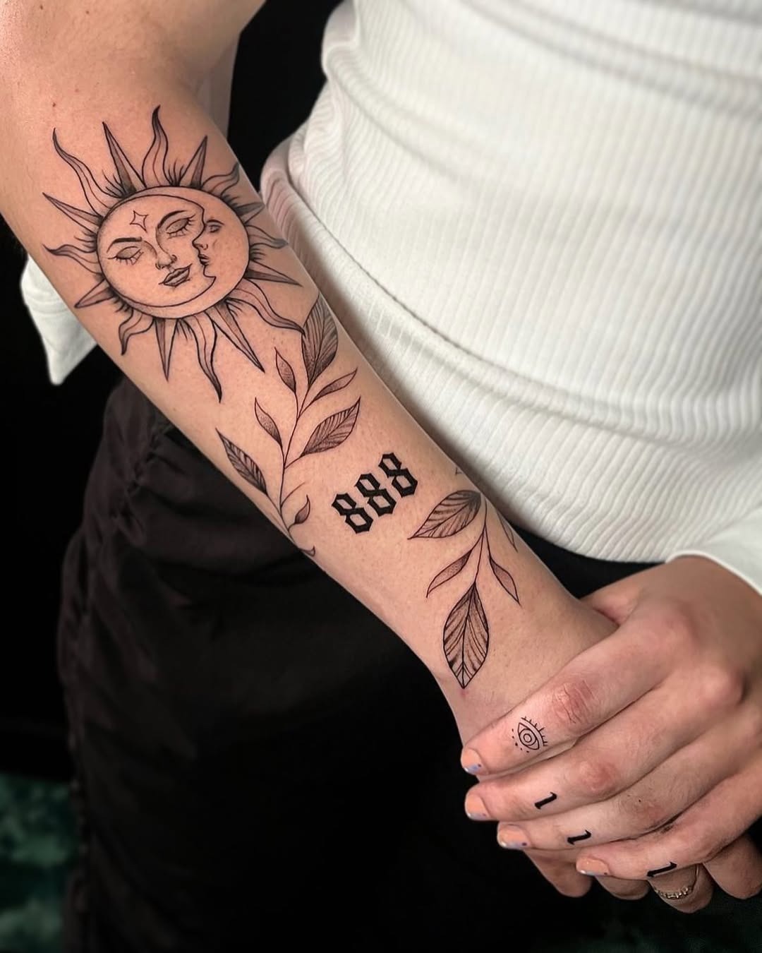 Stunning sun and moon forearm tattoo design Tattoo Design