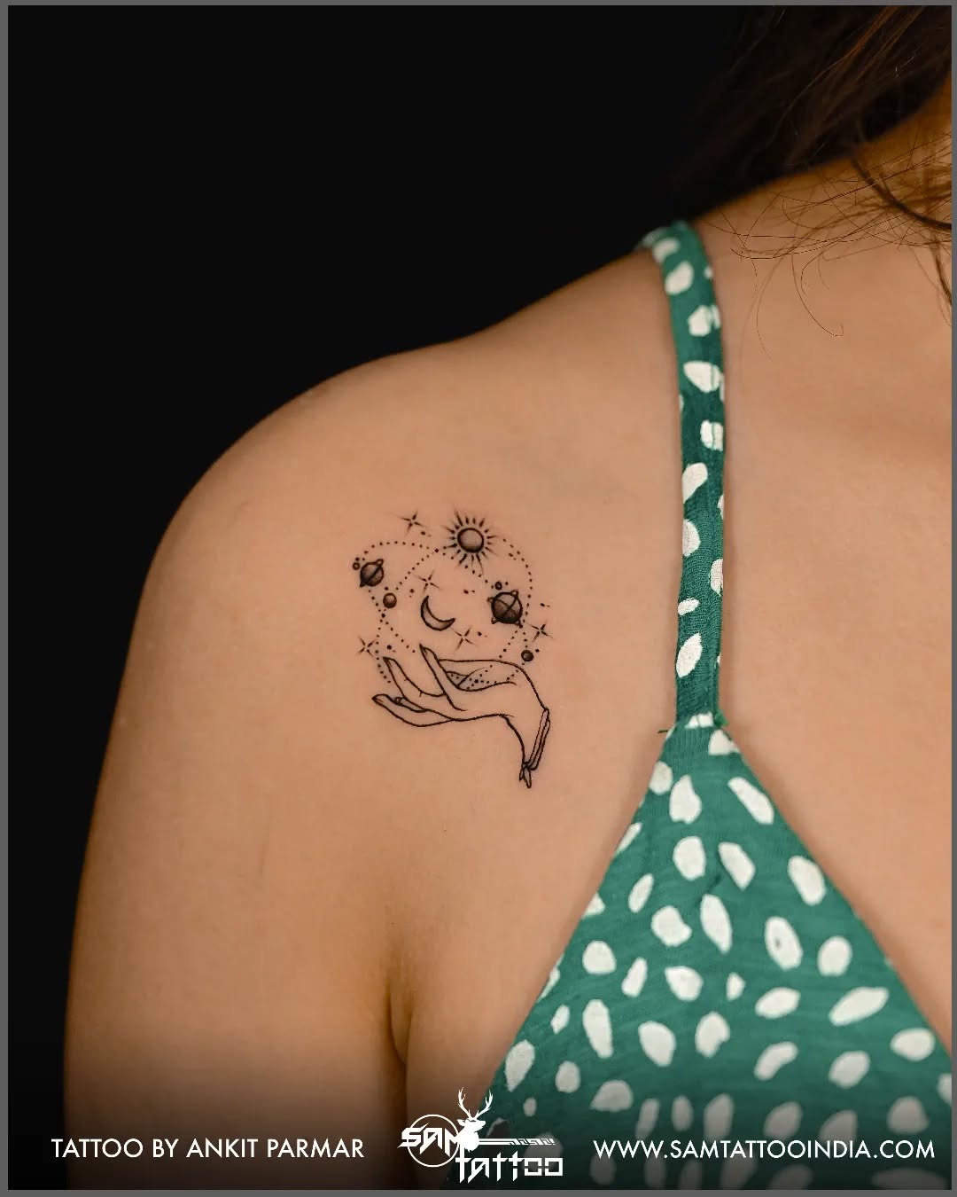 Whimsical Hand Holding Celestial Bodies Tattoo Tattoo Design
