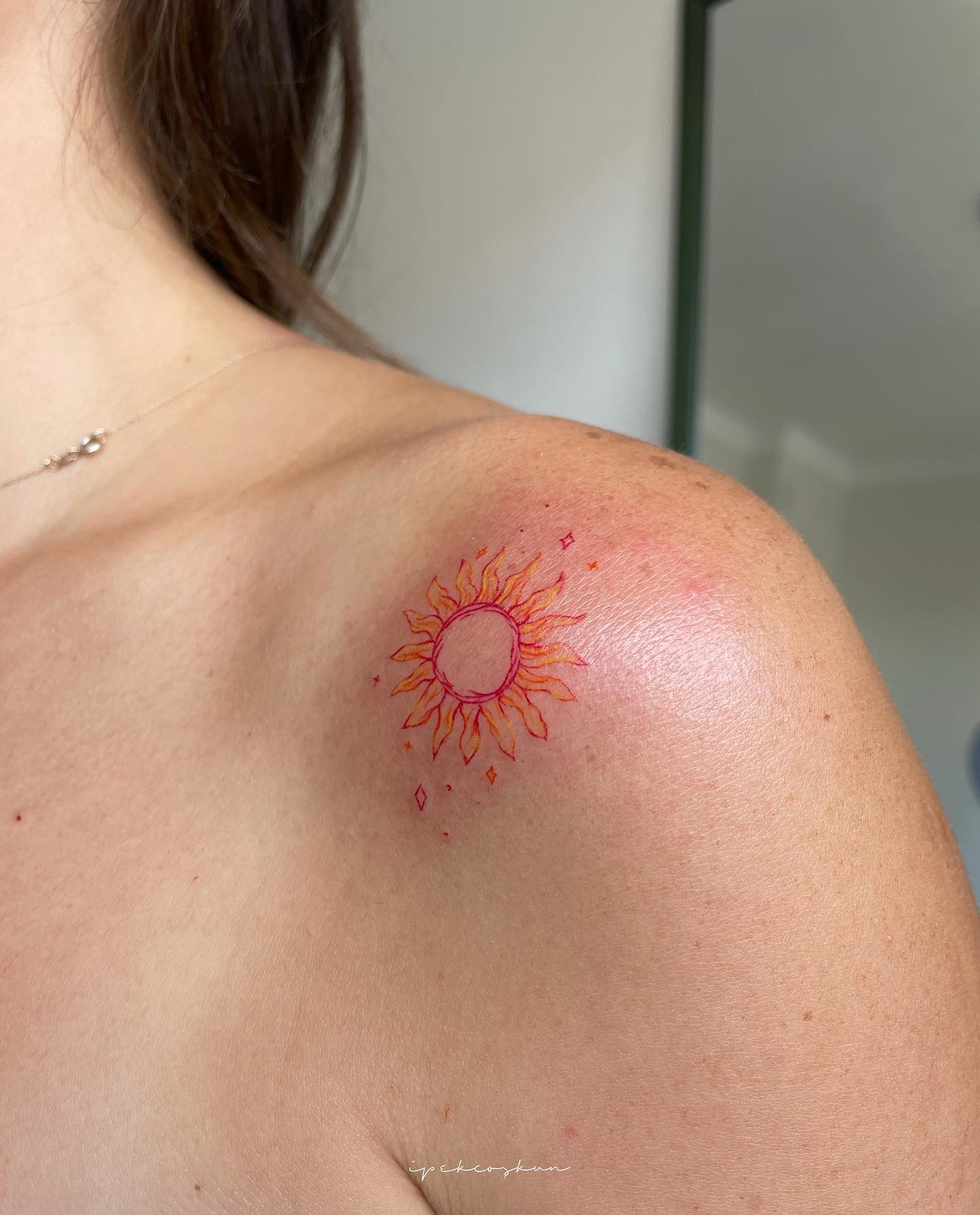 Colorful Sunburst Tattoo Tattoo Design