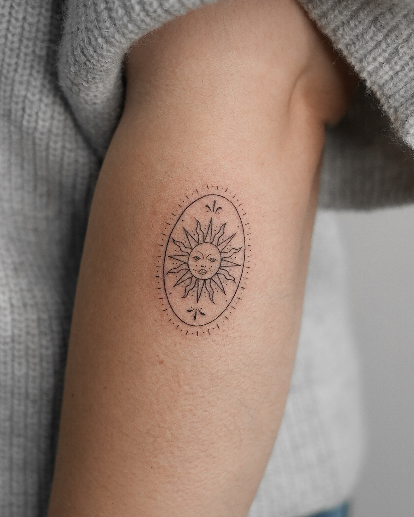 Ornamental Oval Sun Face Tattoo Tattoo Design
