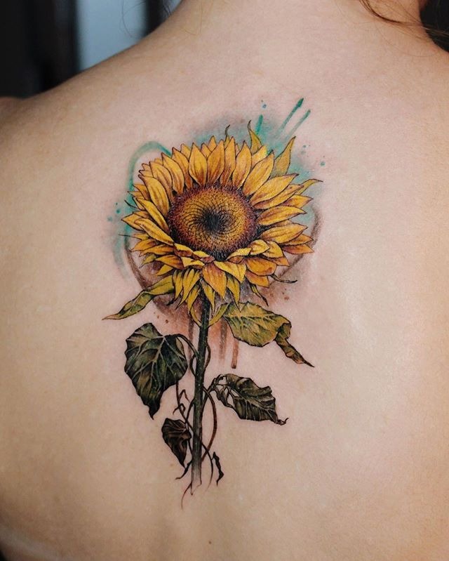 Ethereal Sunflower Tattoo Ideas with Soft Blue Background Tattoo Design