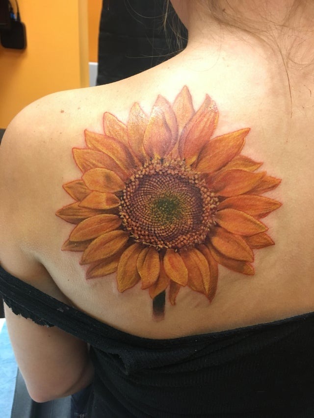 Natural Sunflower Tattoo with Incredible Detail Tattoo Design
