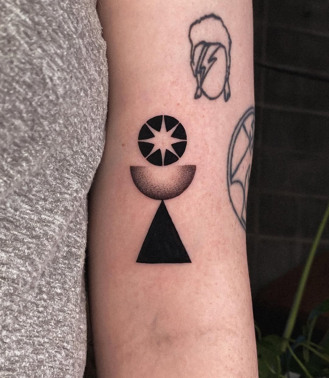 Geometric sunrise tattoo with captivating designs Tattoo Design