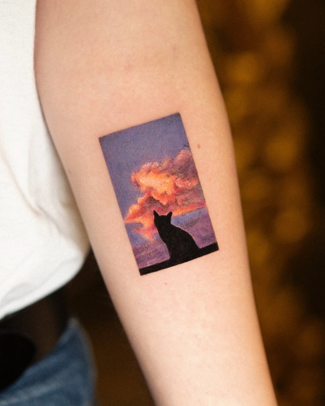 Serene sunrise silhouette of a cat tattoo Tattoo Design