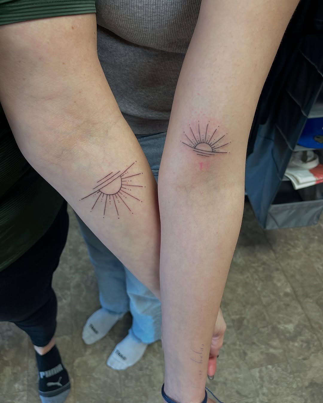 Symbolic sunrise tattoos on graceful arms Tattoo Design