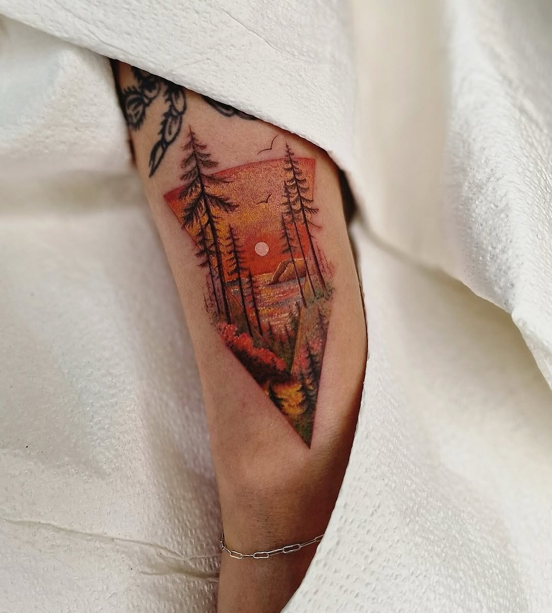 Vibrant sunrise tattoo with nature elements Tattoo Design