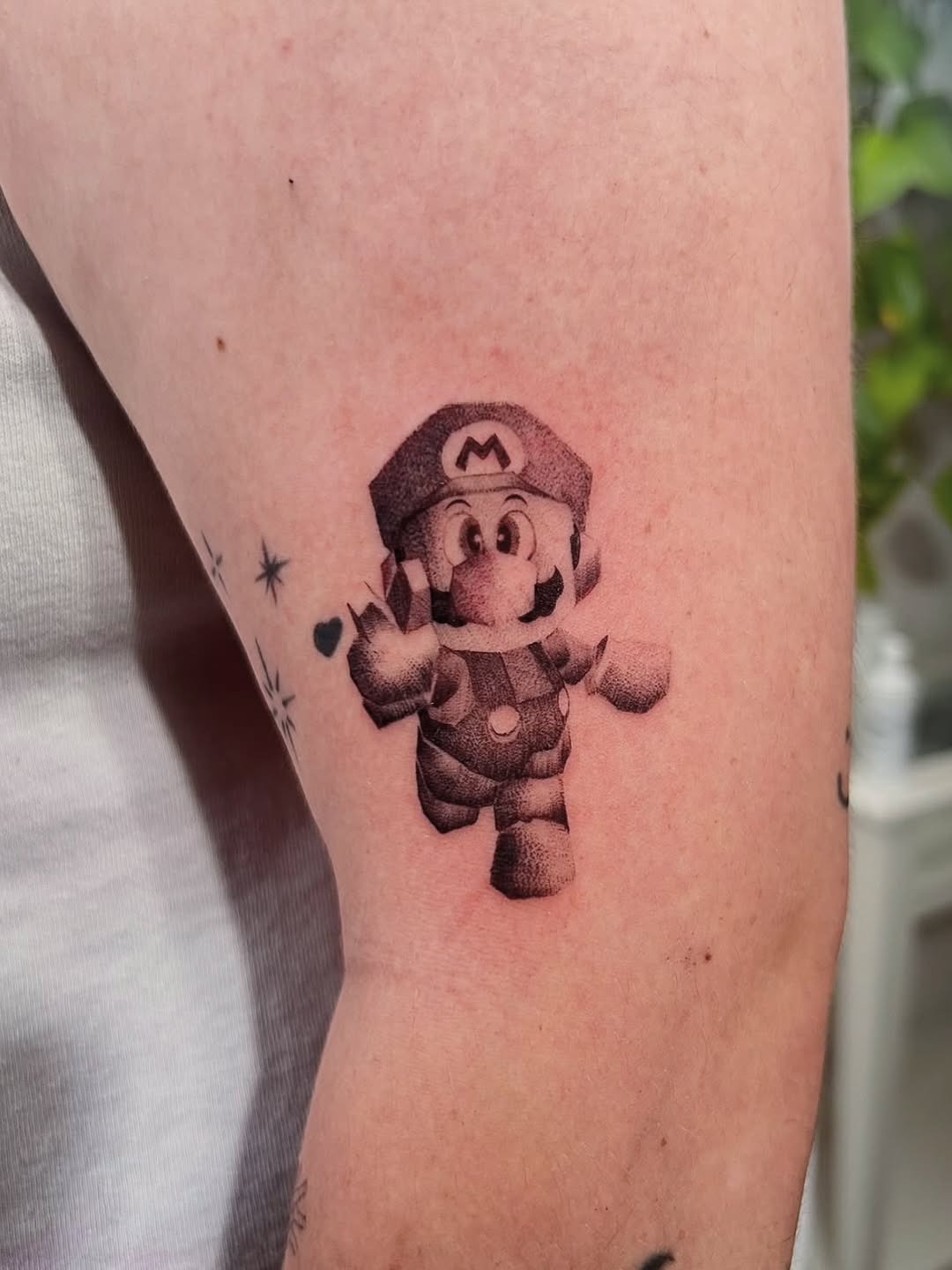 Classic Mario character tattoo in vibrant colors Tattoo Design