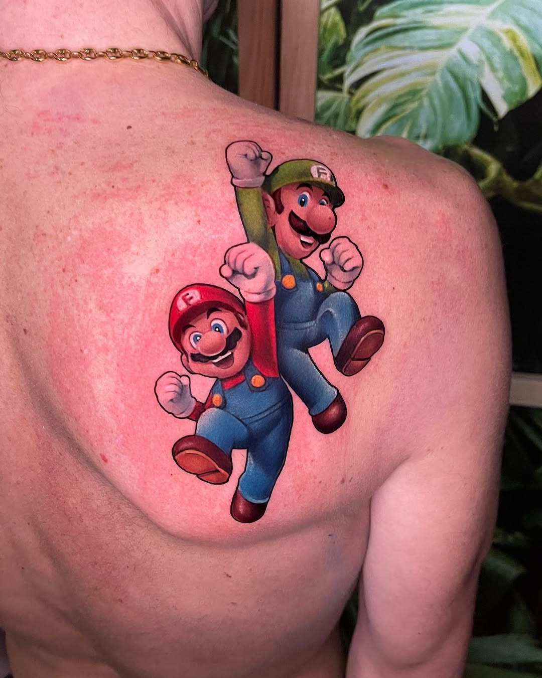 Dynamic Mario and Luigi Tattoo on Back Tattoo Design