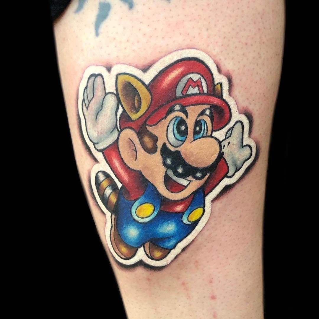Playful Mario Soaring Through the Air Tattoo Design