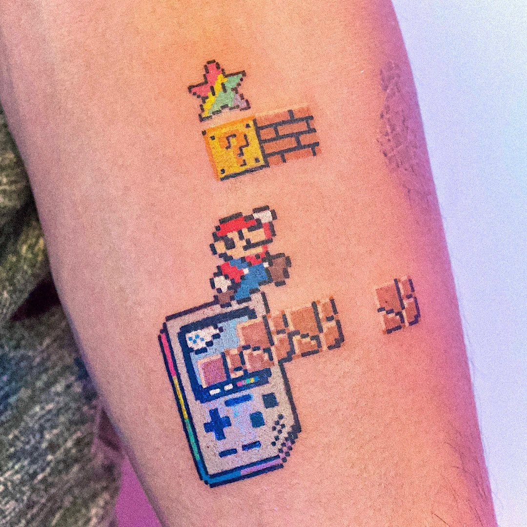 Playful Super Mario tattoo with vibrant colors Tattoo Design