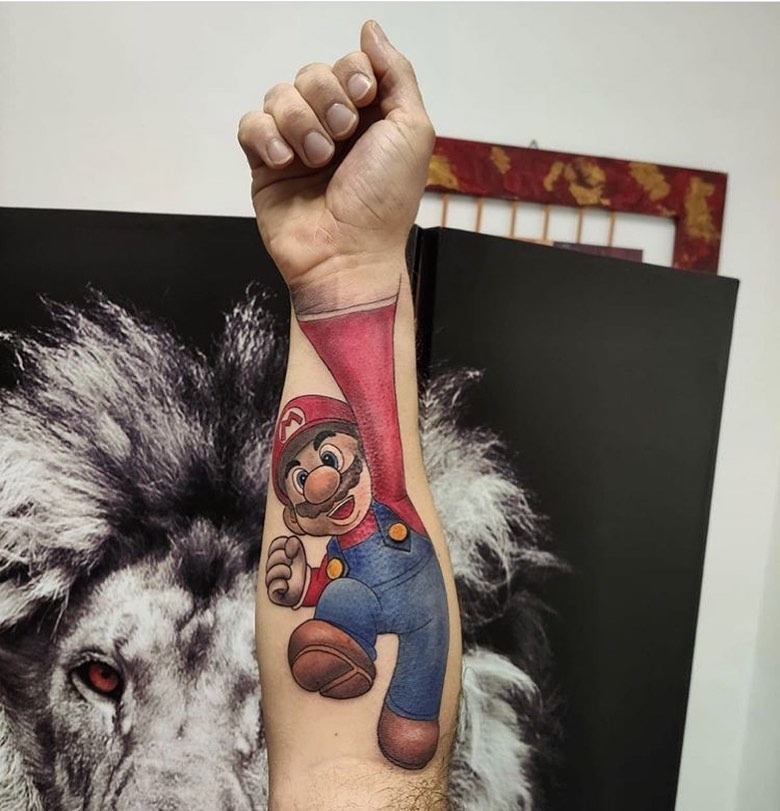 Vibrant Mario Tattoo on Arm Tattoo Design